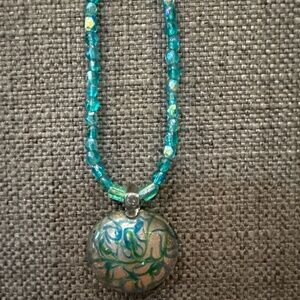 Artisan glass necklace in teals
